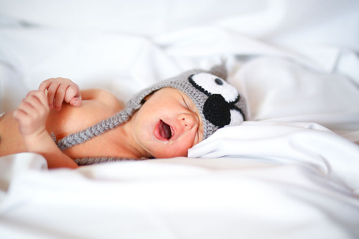 Baby mit Hut
