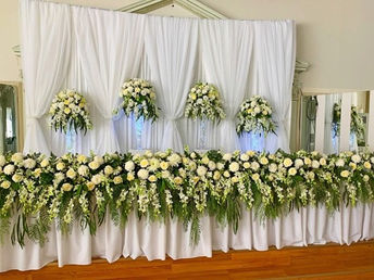 Flower runner and vases with draping