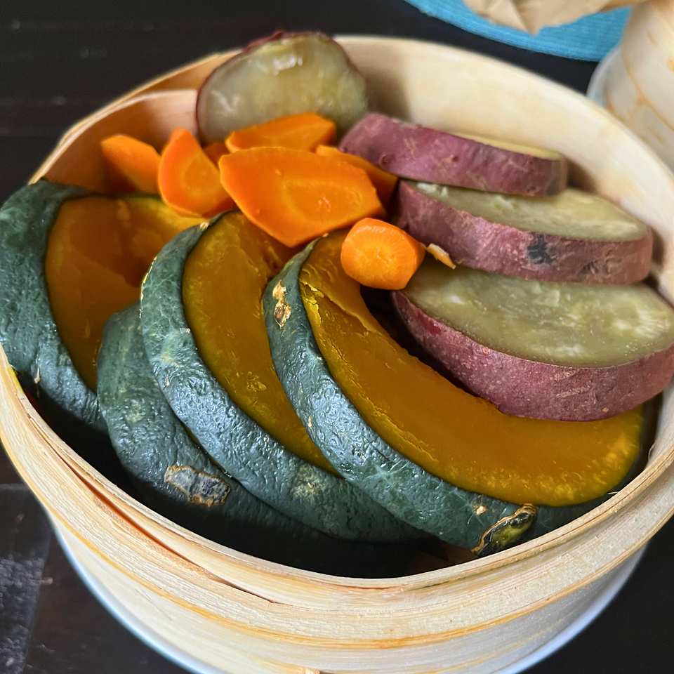 Steamed kabocha, sweet potatoes, and carrots on a seiro