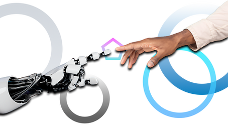 A robotic hand and a human hand reach towards each other, surrounded by overlapping gray and blue circles. MindTRAC Blog