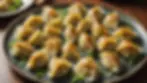 High angle view of a platter filled with cooked dumplings ready to serve