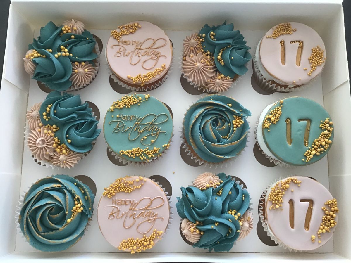 Bespoke celebration cake with intricate floral designs and gold accents, crafted in Solihull, West Midlands.