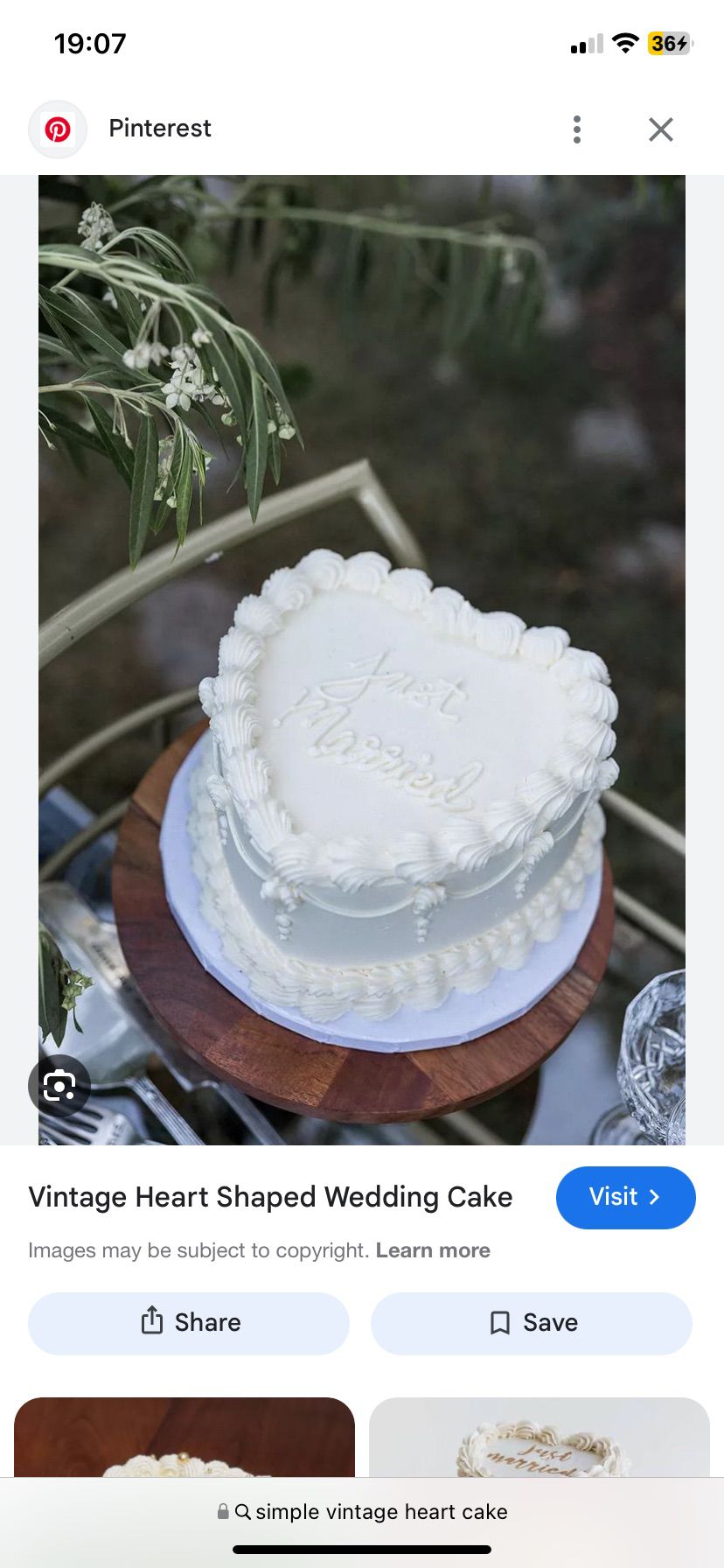 Bespoke celebration cake with intricate floral designs and gold accents in Solihull, West Midlands.