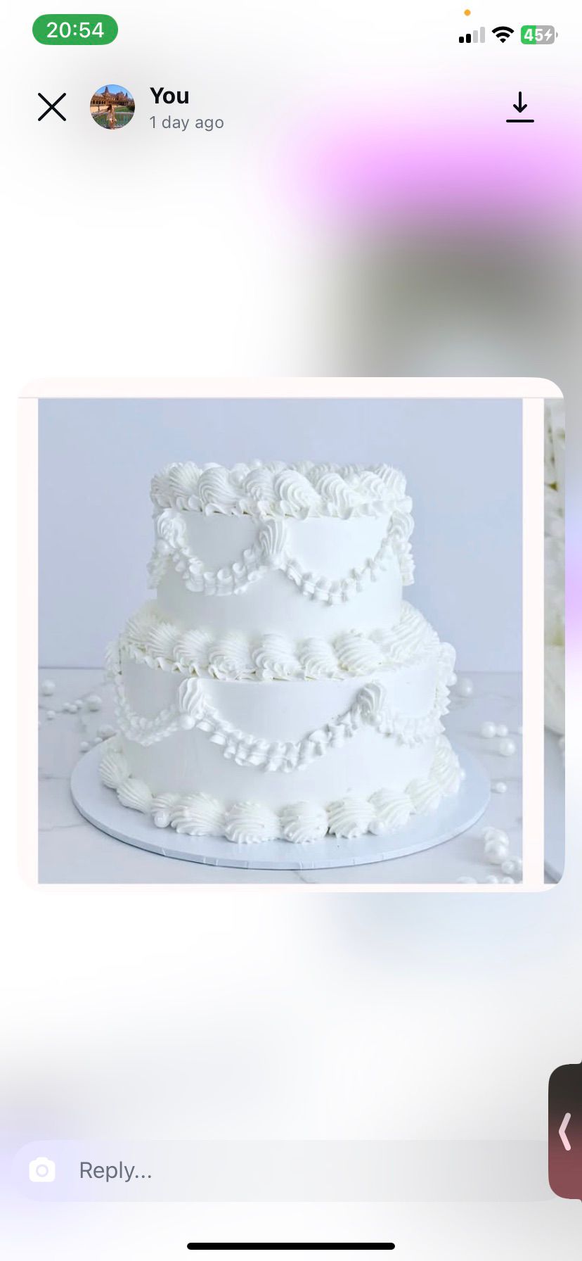 Bespoke celebration cake with intricate floral designs and pastel colors in Solihull, West Midlands.