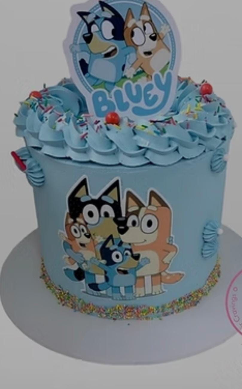 Bespoke celebration cake with intricate floral icing and gold accents in Solihull, West Midlands.