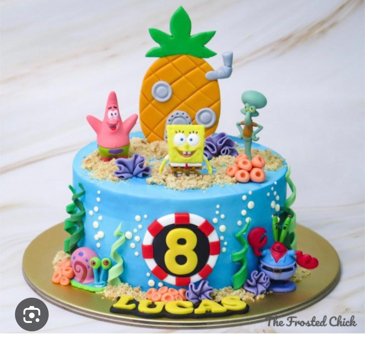 Bespoke cake with intricate floral icing and personalized message, crafted in Solihull, West Midlands for celebration.