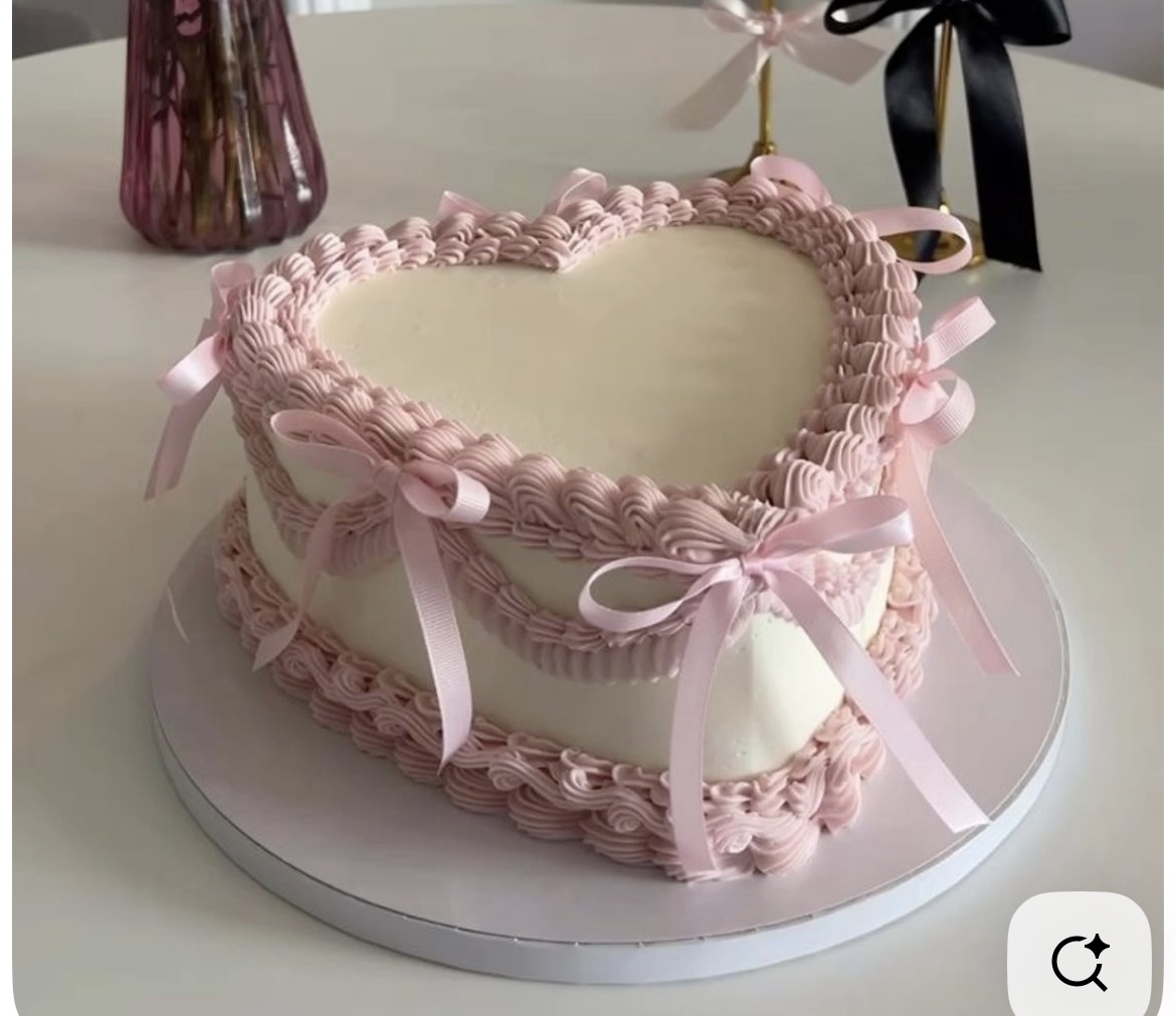 Bespoke celebration cake with intricate floral icing design, crafted in Solihull, West Midlands.