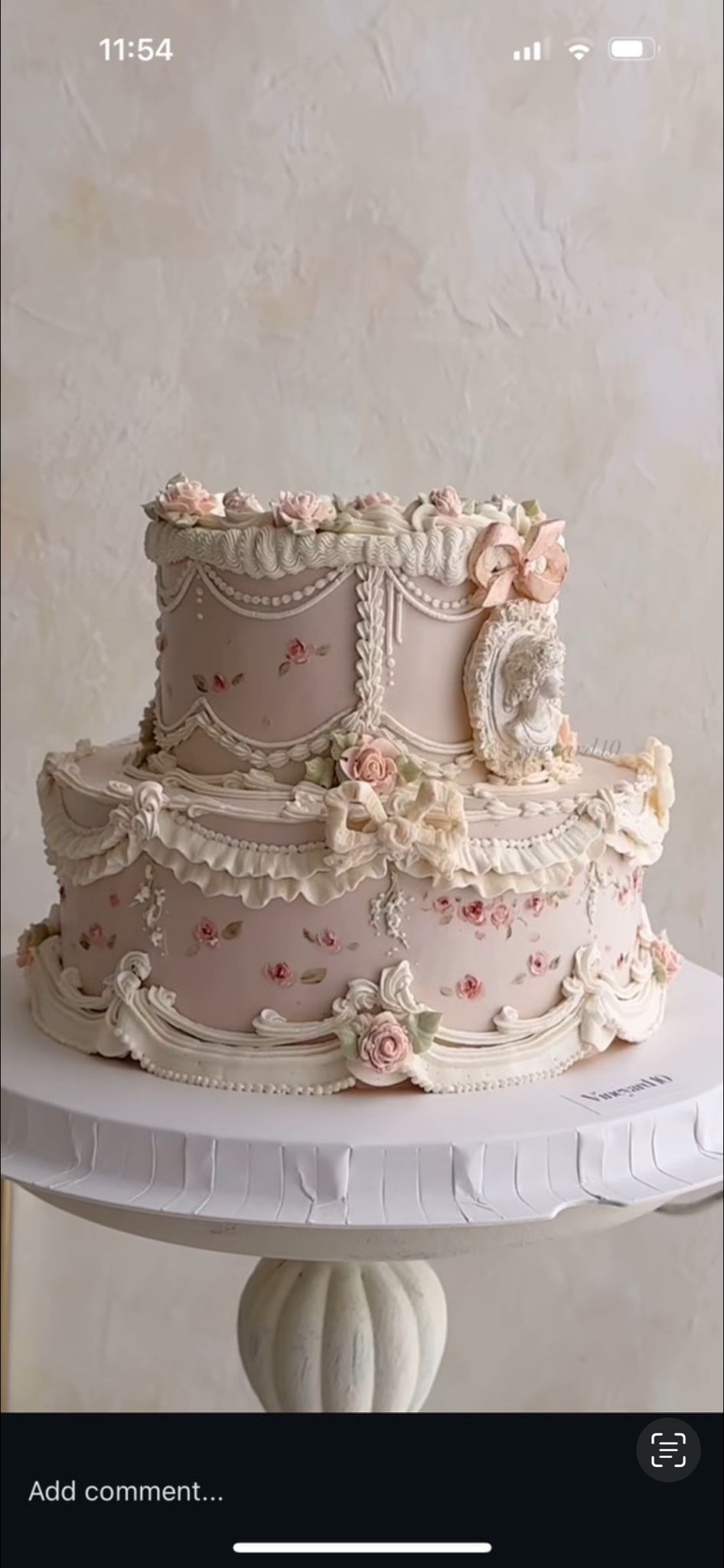 Bespoke celebration cake with intricate floral icing design in Solihull, West Midlands.