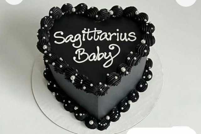 Bespoke celebration cake with intricate floral designs and gold accents, crafted in Solihull, West Midlands.