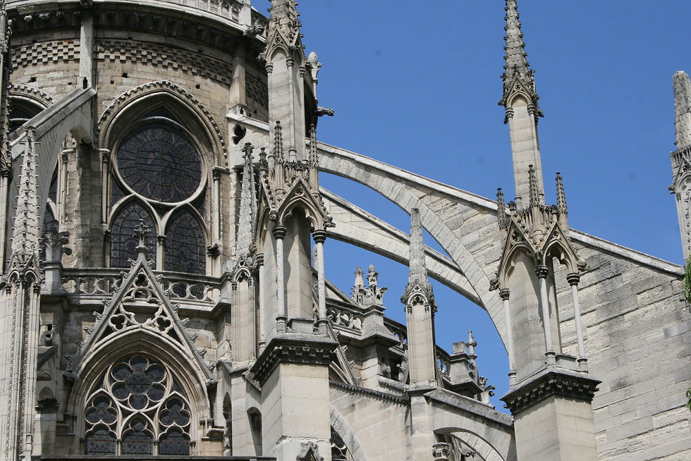 Flying buttresses extending out of the Notre Dame Cathedral in Paris