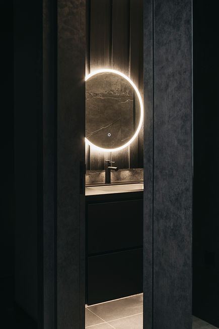 Dark Japanese interior design by Studio Metanoia, showcasing contemporary elements in a Singapore condominium