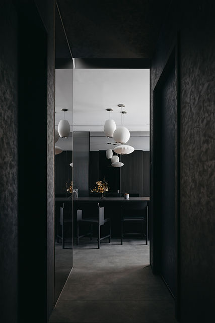 Dark Japanese interior design by Studio Metanoia, showcasing contemporary elements in a Singapore condominium