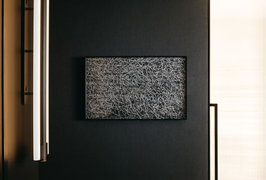 Dark Japanese interior design by Studio Metanoia, showcasing contemporary elements in a Singapore condominium