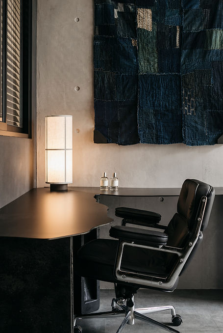 Dark Japanese interior design by Studio Metanoia, showcasing contemporary elements in a Singapore condominium