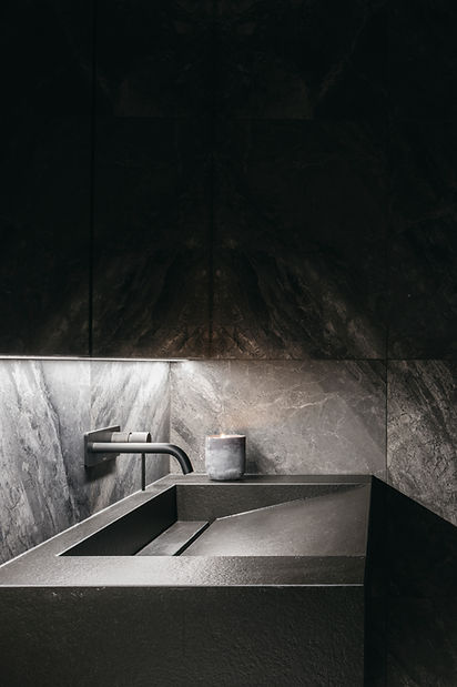Dark Japanese interior design by Studio Metanoia, showcasing contemporary elements in a Singapore condominium