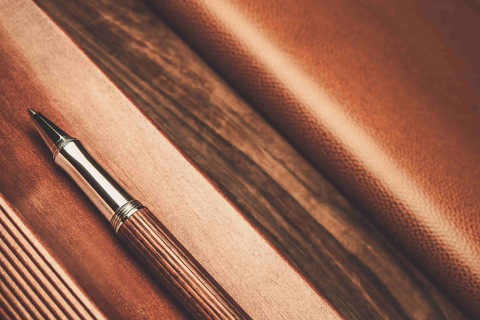 elegant-wooden-pen-on-a-warm-brown-surface-2026-03-09-09-18-14-utc (2).jpg