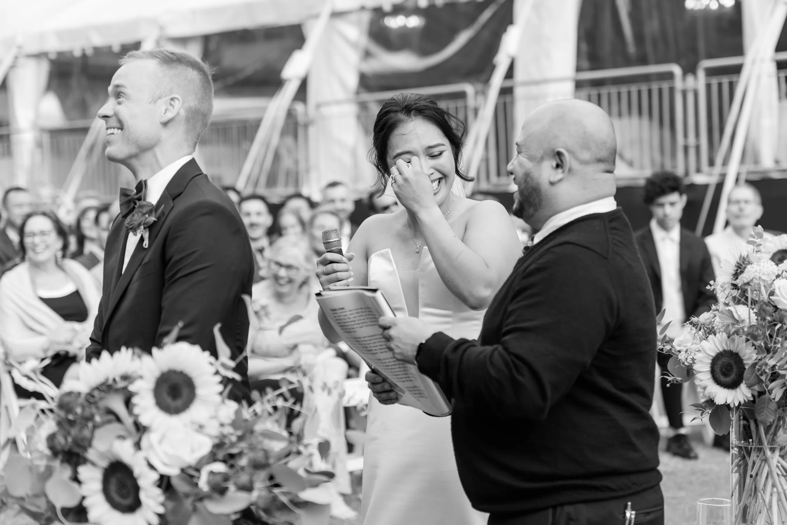 Candid black and white shot of bride crying during her summer wedding at Hart House, Burnaby, British Columbia
