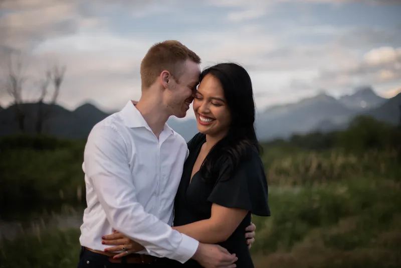 engaged couple holding each other for an engagement photoshoot in vancouver british columbia