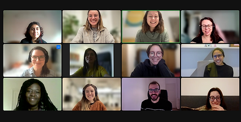Twelve smiling people in a video call, women in tech uk discussing business.