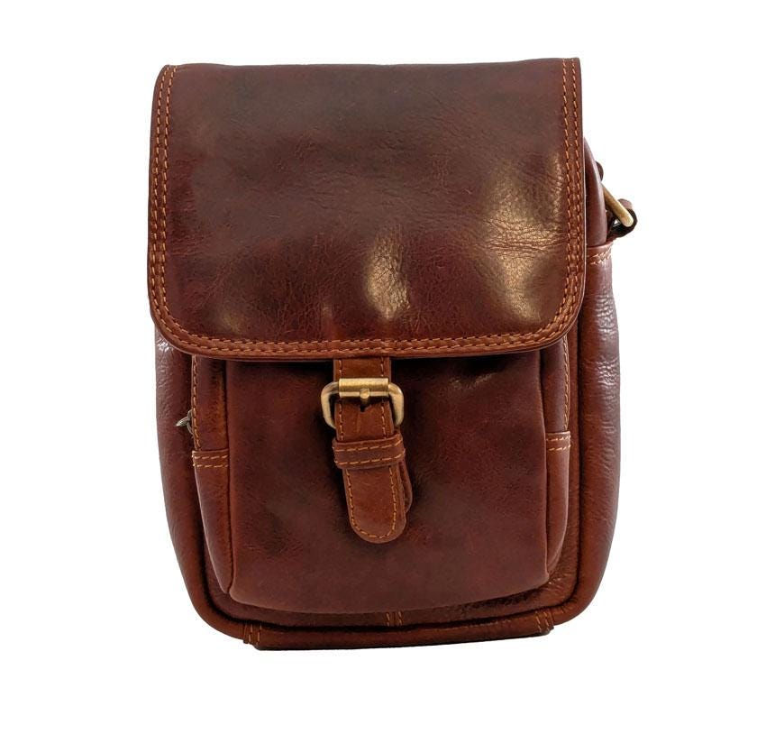 Small unisex brown leather messenger crossbody bag with buckle