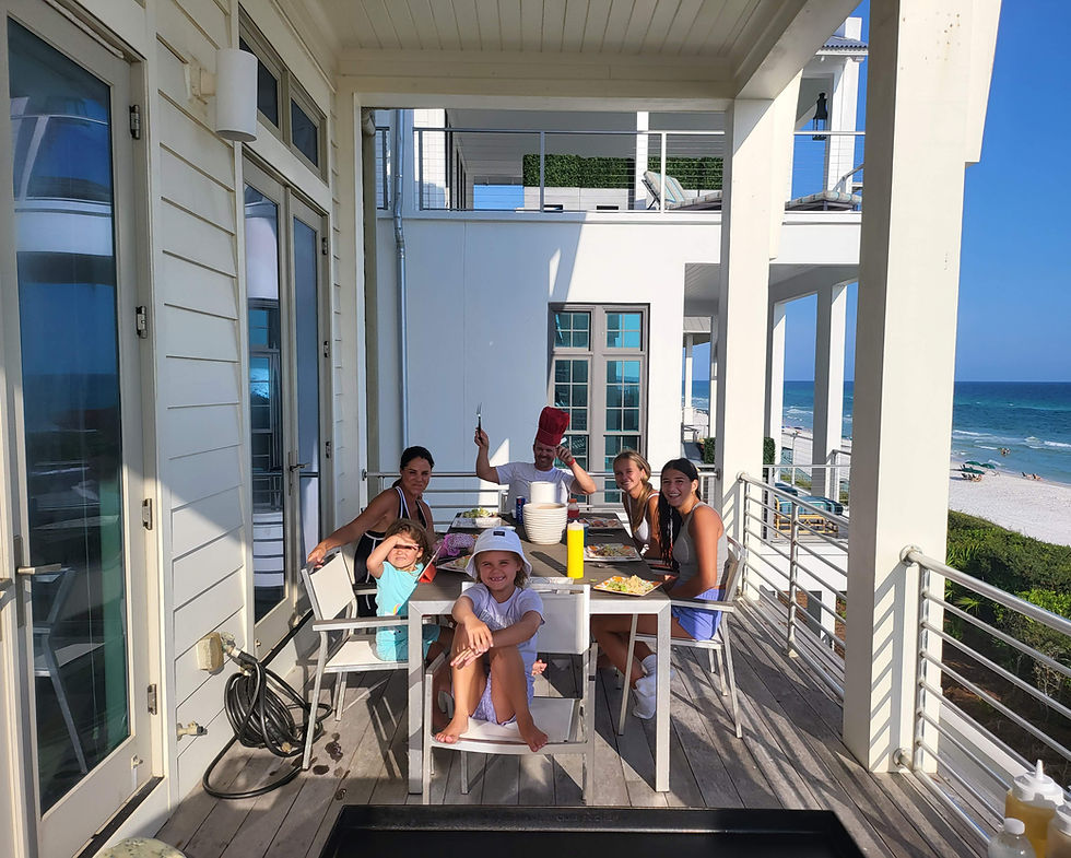 Hibachi grill set up on the deck of a Navarre Beach rental