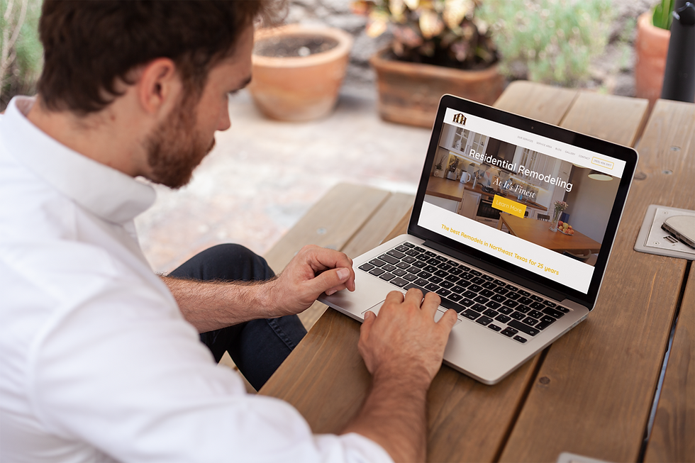 Man browsing Rodeo Creative's kitchen design website