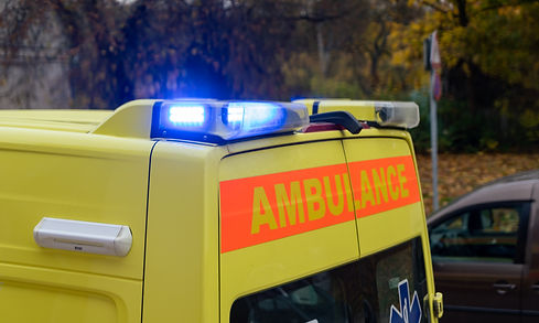 Ambulance with flashing blue lights