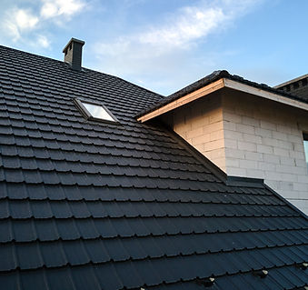 closeup-house-roof-top-covered-with-ceramic-shingles-tiled-covering-building