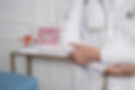 front-view-blurry-doctor-wearing-stethoscope.jpg