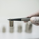 metal pinchers clinging a metal weight