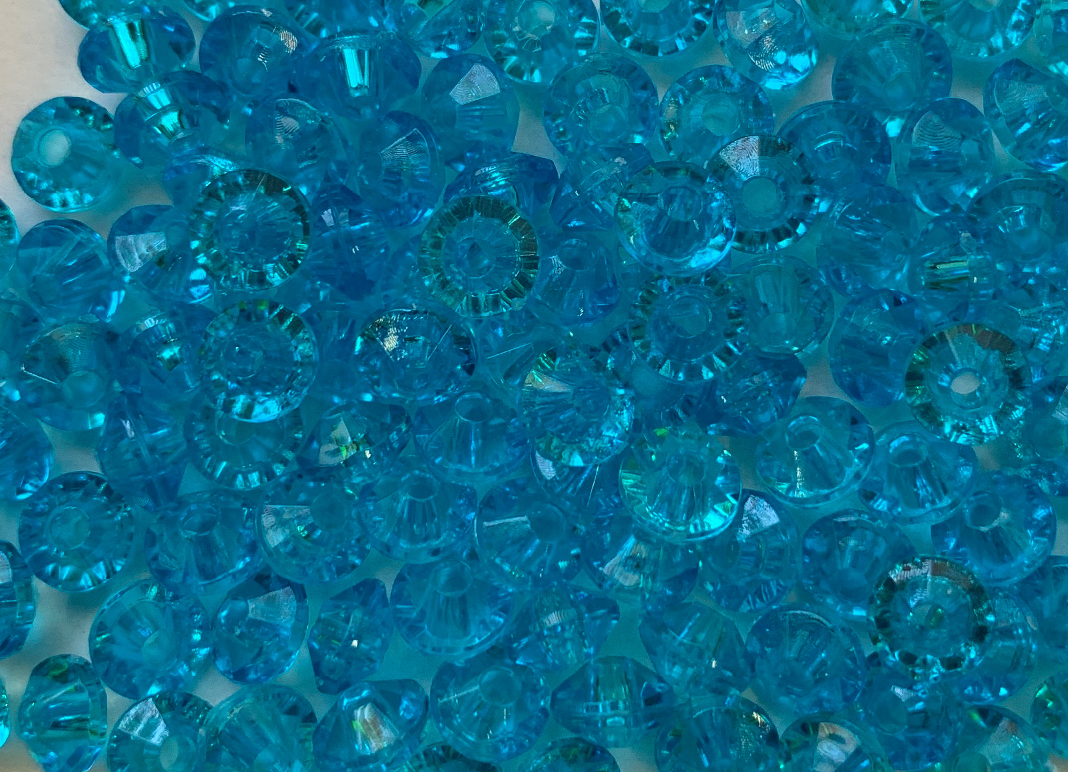 #26 - Transparent Turquoise 4mm x 6mm Rondell Beads