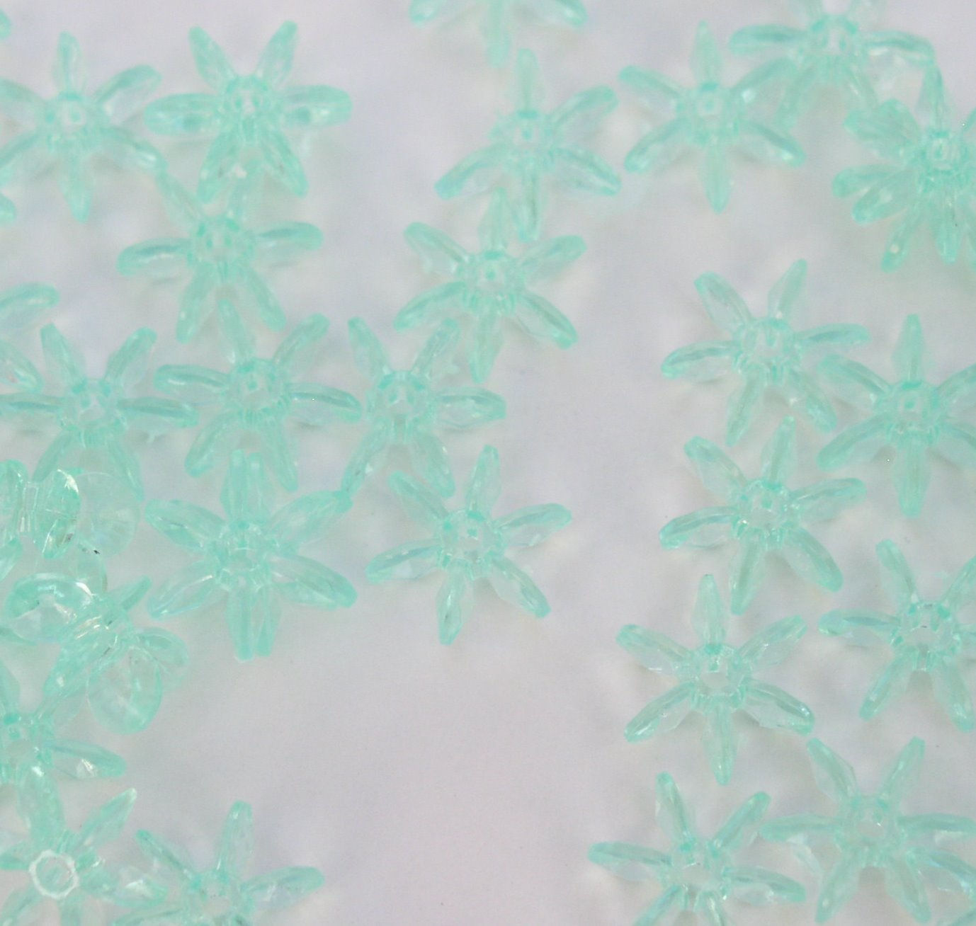 #35 - Transparent Sea Mint 12mm Starflake Beads