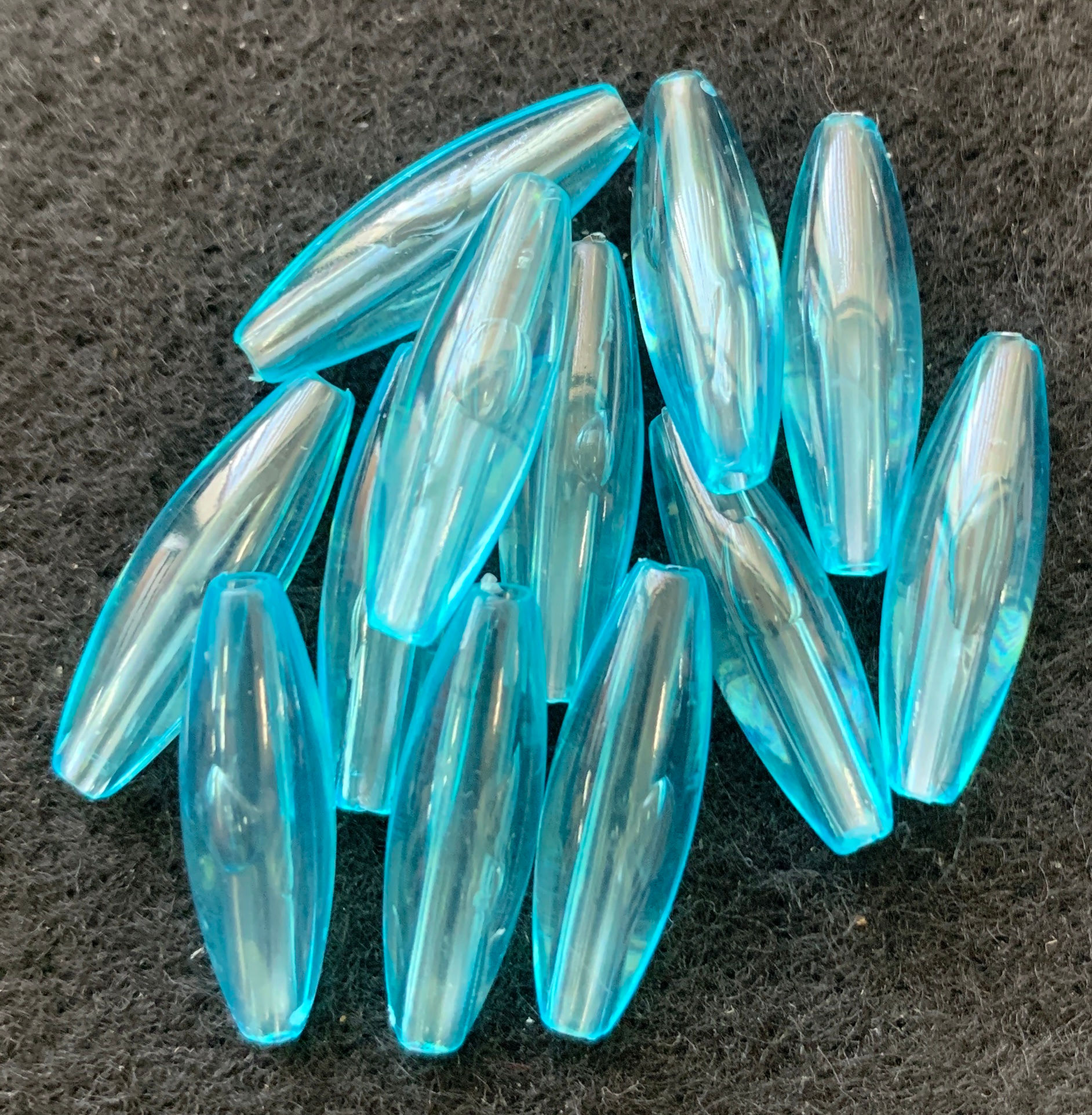 #36 - Transparent Light Turquoise 19mm x 6mm Oval Beads