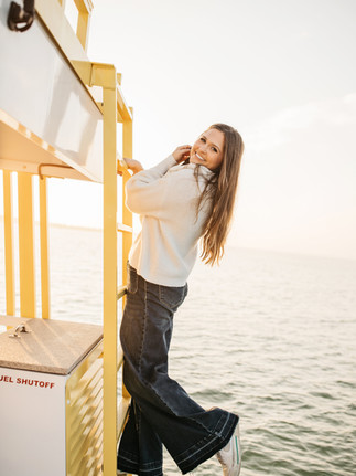 Madison Sullivan Wallace, founder of Crab Island Adventures, pictured on the water along the Gulf Coast, representing women-led entrepreneurship in the coastal boating industry.