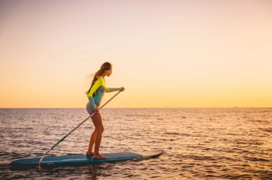 Stand-Up Paddleboarding at Sunset