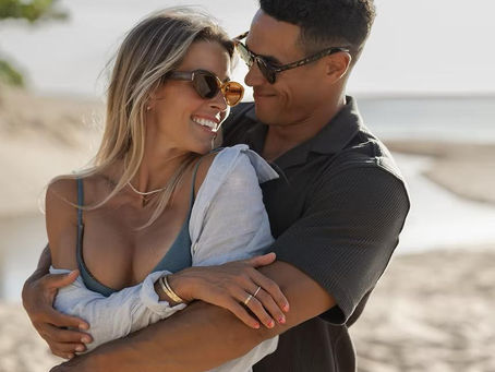 A couple embracing during a photo shoot