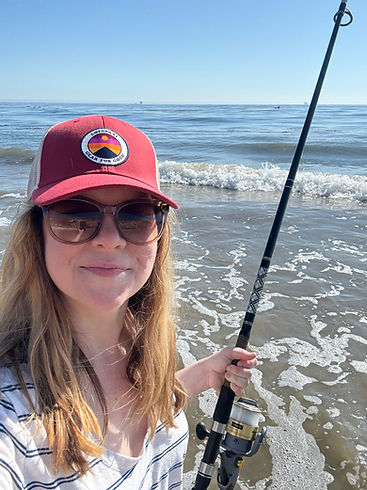 Kady Fleckenstein, LMFT, surf fishing in her time off with her husband and sons.