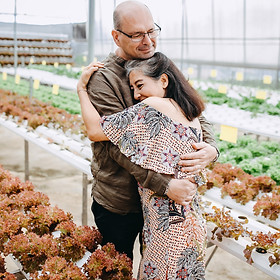 man hugging woman inside garden house_edited.jpg