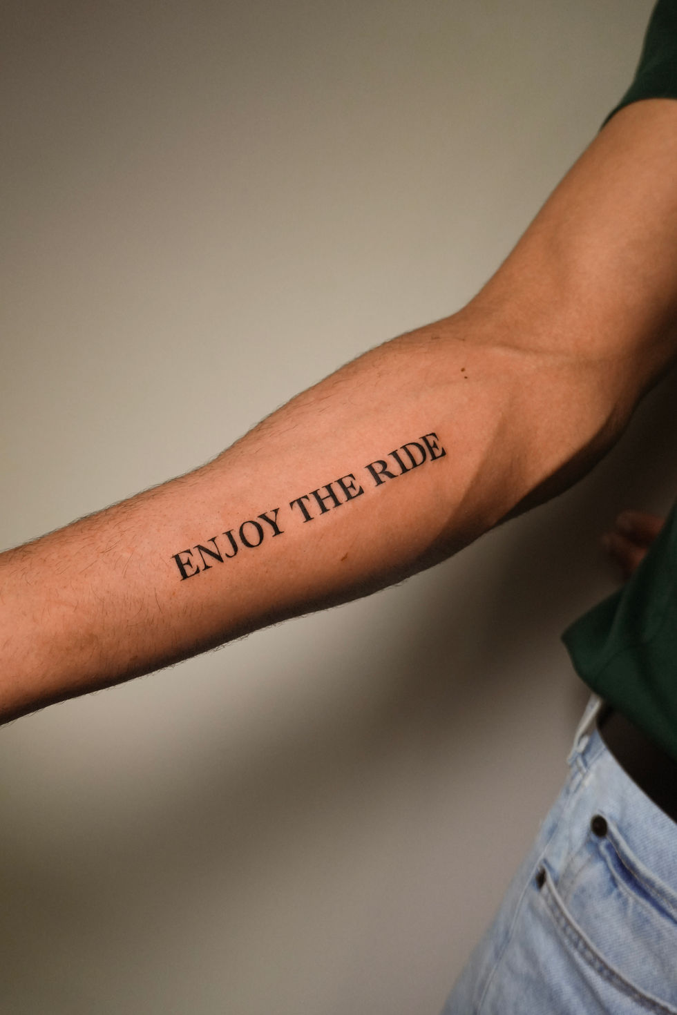 bold script tattoo