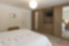 Custom-fit bedroom with globe light