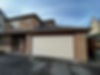 House with a wide garage and white garage door
