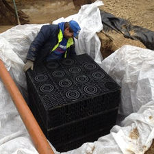 garden drainage system being fitted