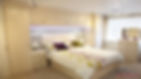 Spacious custom bedroom with wooden units