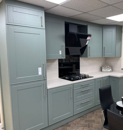 Soft duck egg new kitchen cabinets with white counters
