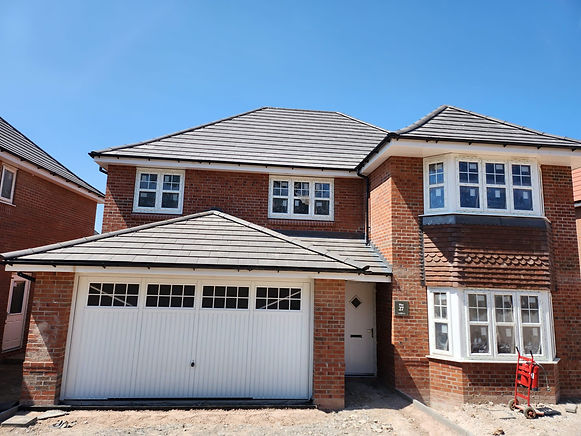 Large house with a newly installed garage door