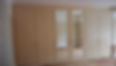 Fitted bedroom cupboards with mirrors