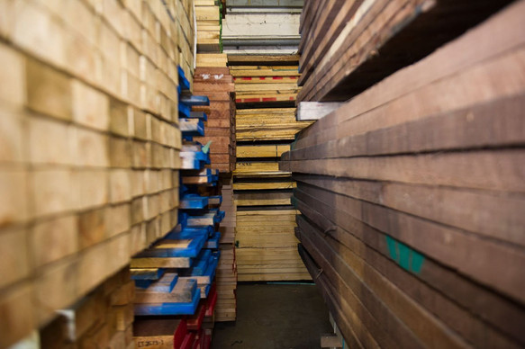 between the timber stacks