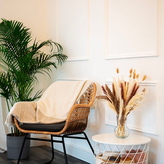 Woven chair next to side table