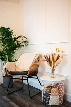 Chair in corner with side table