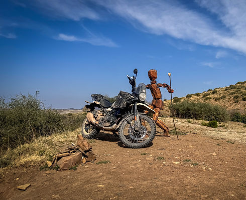 Adventure motorcycle riding through the Karoo on a Royal Enfield Himalayan 450 near Nieu Bethesda South Africa